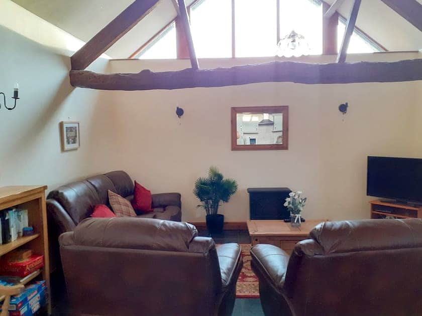 Beamed living space | The Barn, Talsarnau, near Harlech