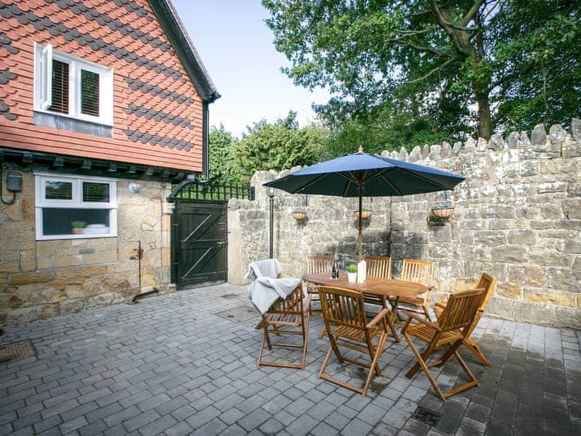 Enclosed patio area with outdoor furniture | Salomons Country Cottage, Tunbridge Wells