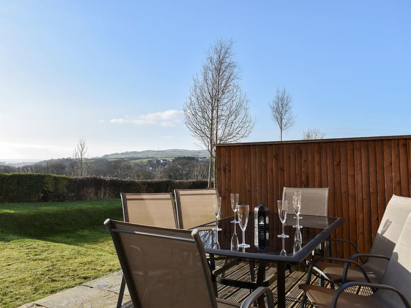 Sitting-out-area with garden furniture | Bramblewick Cottage, Whitby