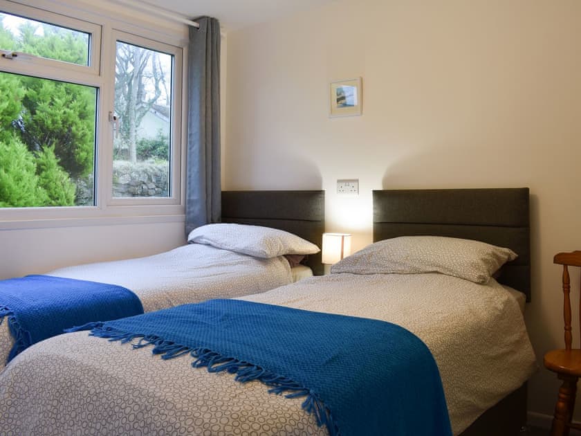 Inviting bedroom with twin single beds | Chalet 7 - Mount Hawke Holiday Bungalows, Mount Hawke, near Redruth