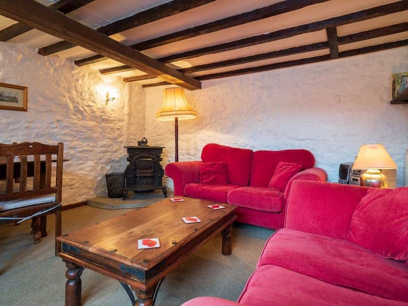 Delightful beamed living area | Buttermilk Cottage - The Old Dairy and Buttermilk Cottage, Youlgreave, near Bakewell