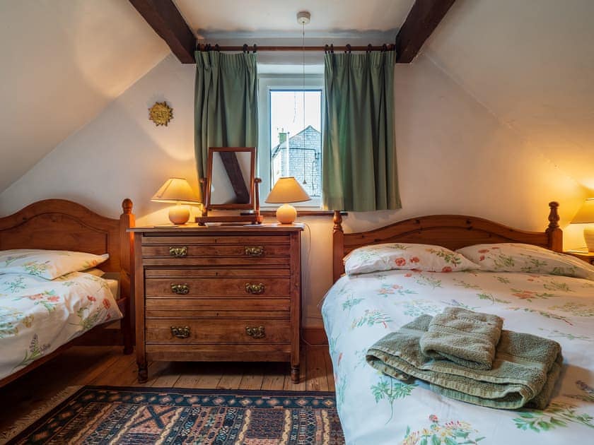Large second bedroom with double and single beds | Buttermilk Cottage - The Old Dairy and Buttermilk Cottage, Youlgreave, near Bakewell