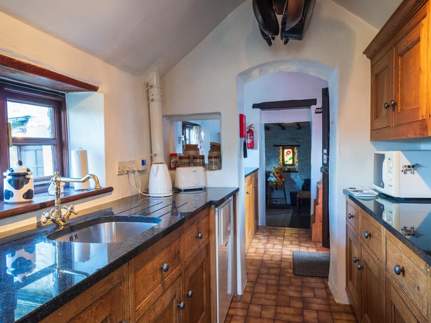 Galley-style kitchen | The Old Dairy - The Old Dairy and Buttermilk Cottage, Youlgreave, near Bakewell