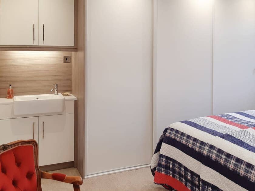 Wash basin in the bedroom | Smitten Cottage, Rhyl