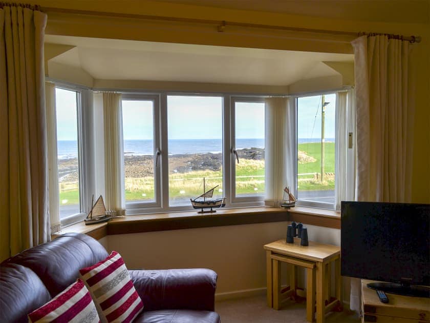 Panoramic sea views fom the living room | Dunlin, Beadnell