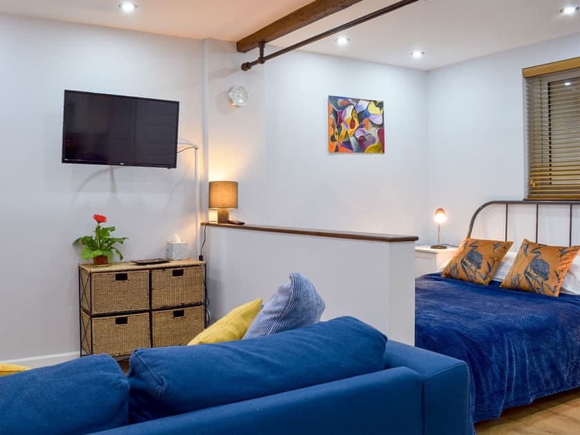 Comfortable living area leading into the bedroom area | The Studio, Long Hanborough, near Witney