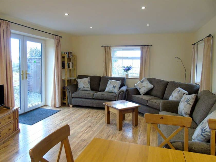 Comfortable living area | Tan Rallt Barn, Tregarth, near Bangor