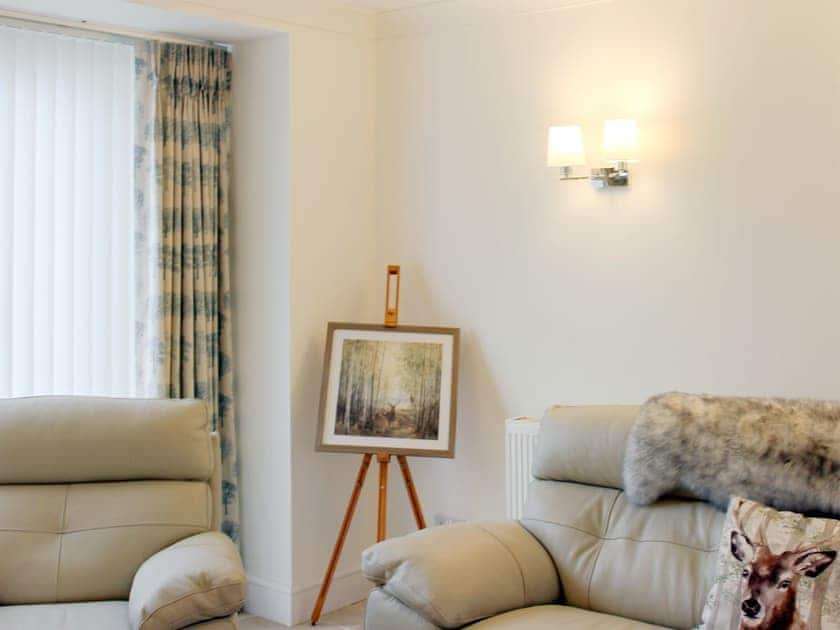 Comfy sitting room | Rhunahaorine Cottage, Tayinloan, near Tarbert