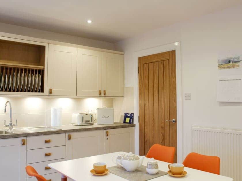 Well equipped kitchen/ dining room | Rhunahaorine Cottage, Tayinloan, near Tarbert