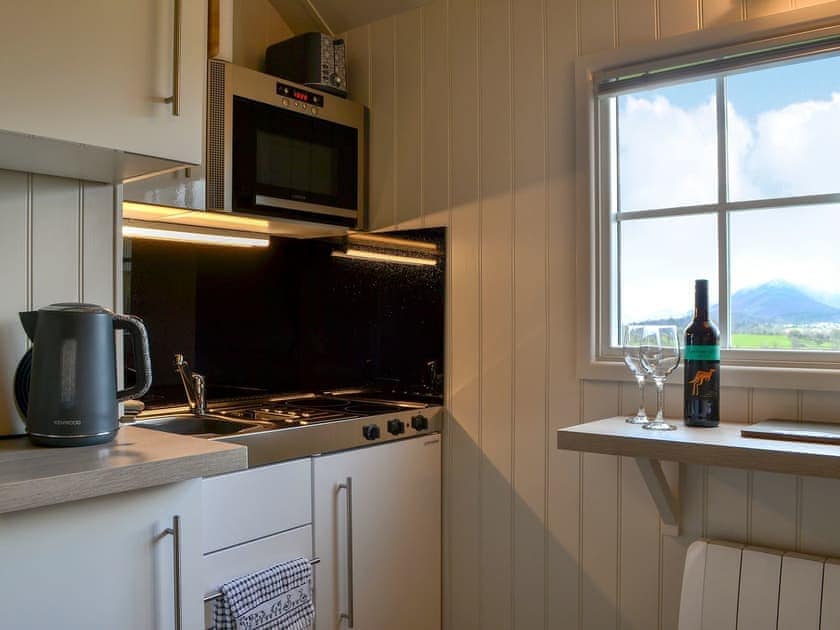 Compact kitchen | Derwent - Lake View Shepherds Huts, Millbeck, near Keswick