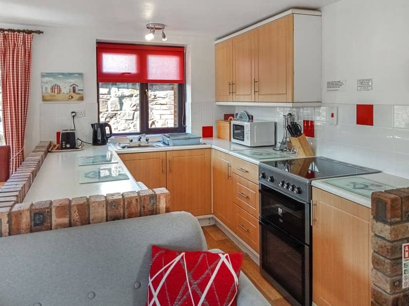 Fully-appointed kitchen area | Tarquol Cottage - Stowford Lodge Holiday Cottages, Langtree, near Great Torrington