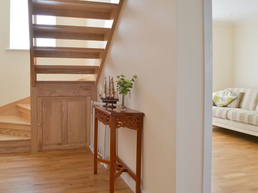 Airy hallway with open tread staircase | Driftwood, Port Isaac