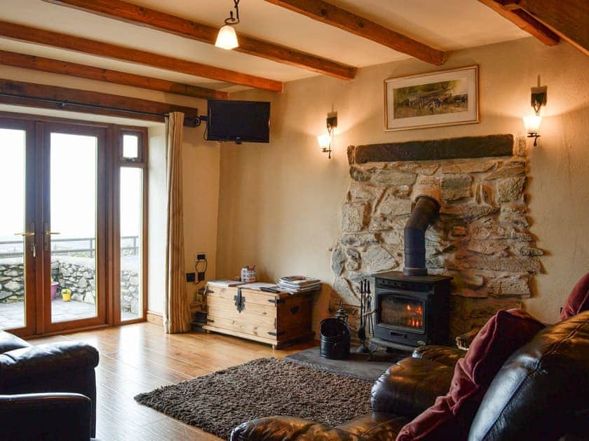 Cosy living room with wood burner | Beudy Bach, Cilgwyn, near Caernarfon