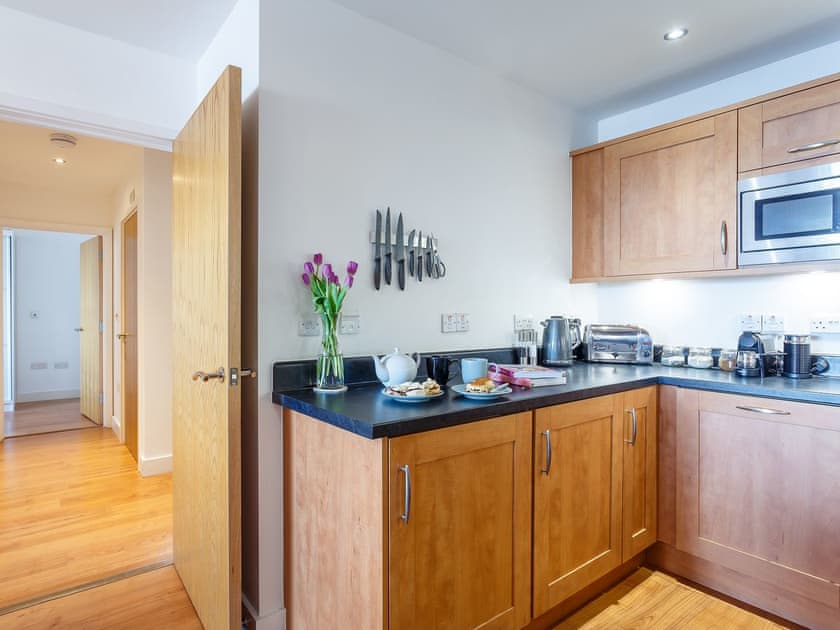 Well-equipped kitchen area | Fistral Waves - Ocean 1 Apartments, Newquay