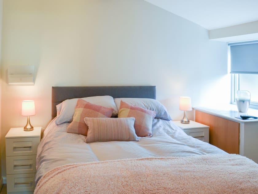 Welcoming bedroom with comfortable double bed | The Old Forge Cottage, Sewerby, near Bridlington