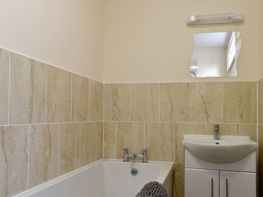Family bathroom with bath and separate shower cubicle | Flowergate House, Whitby