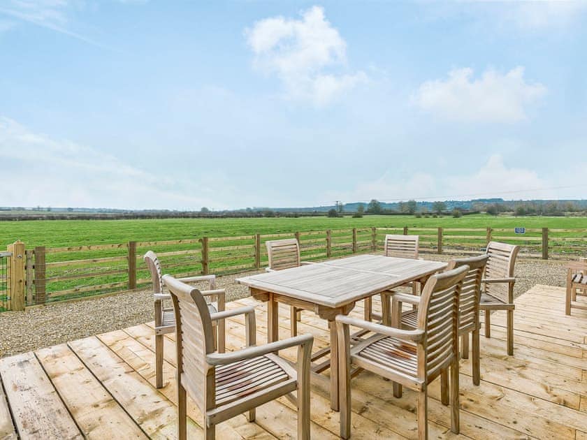 Inviting sitting-out-area with stunning views | Big Drift Barn - Fairchilds, Caldecott, near Uppingham
