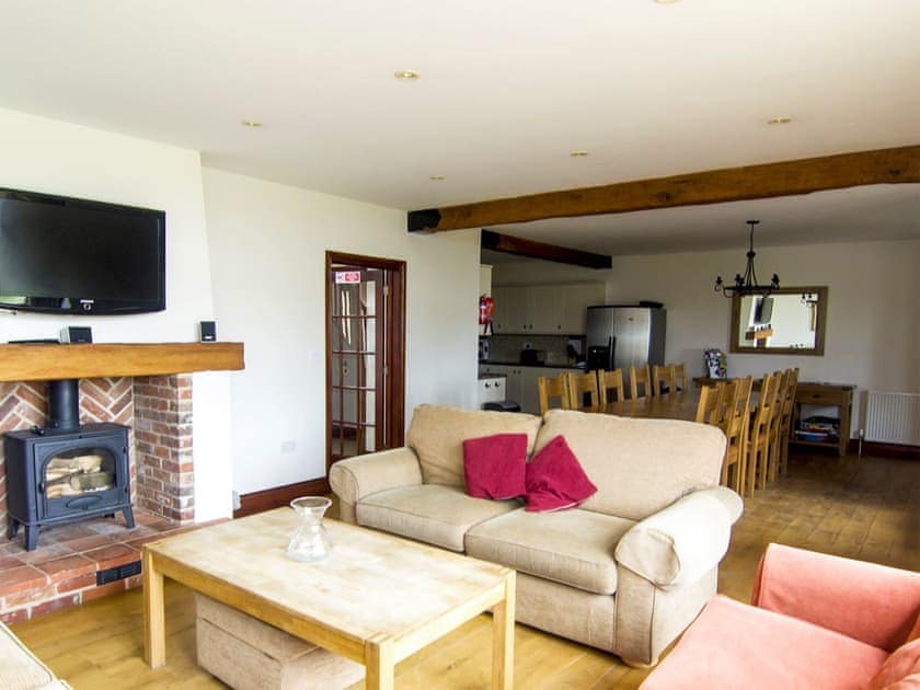 Comfortable living with wood burner | Kestrel Barn - Piggyback Barns, Sculthorpe, Fakenham