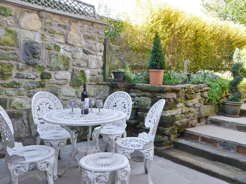 Paved patio area with outdoor furniture | Toad Hall, Helmsley