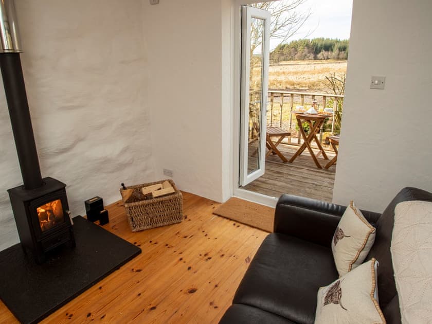 Cosy conservatory with wood burner | Balloan Farm Cottage, Lairg