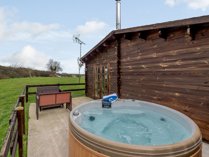 Relax and take in the view from the private hot tub | Halfmoon Wood - Readyfields Farm, Caunton, near Newark
