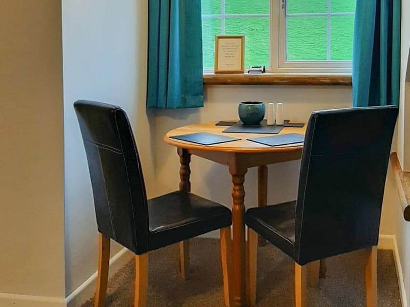 Intimate dining area | Forge Cottage - Longmeadow Farm, Shaldon, near Teignmouth