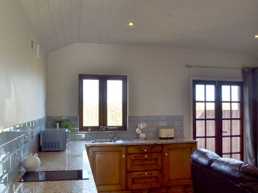 Open plan living space | Fern Lodge - Sandbank Lodges, Melbourne, near Derby