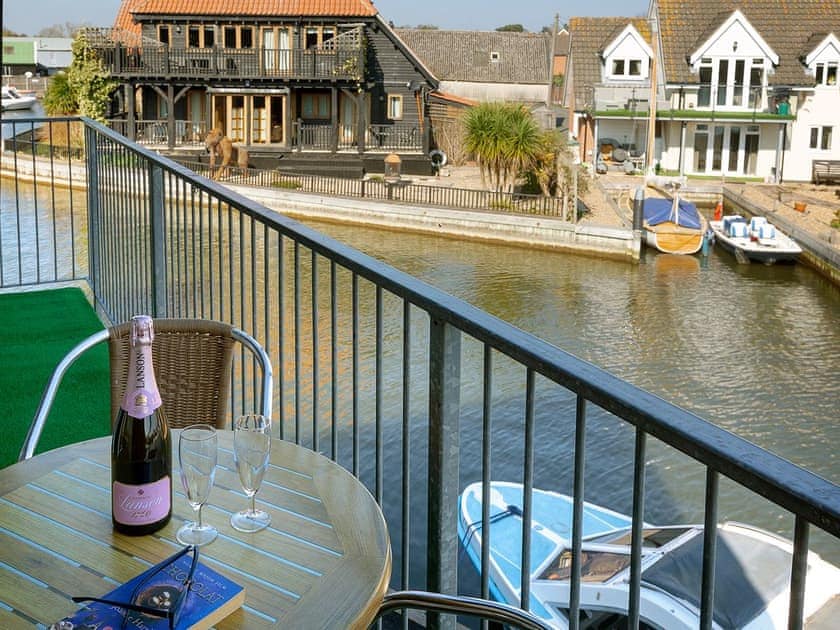 Balcony overlooking the water | Coot - Daisy Broad Lodges, Wroxham