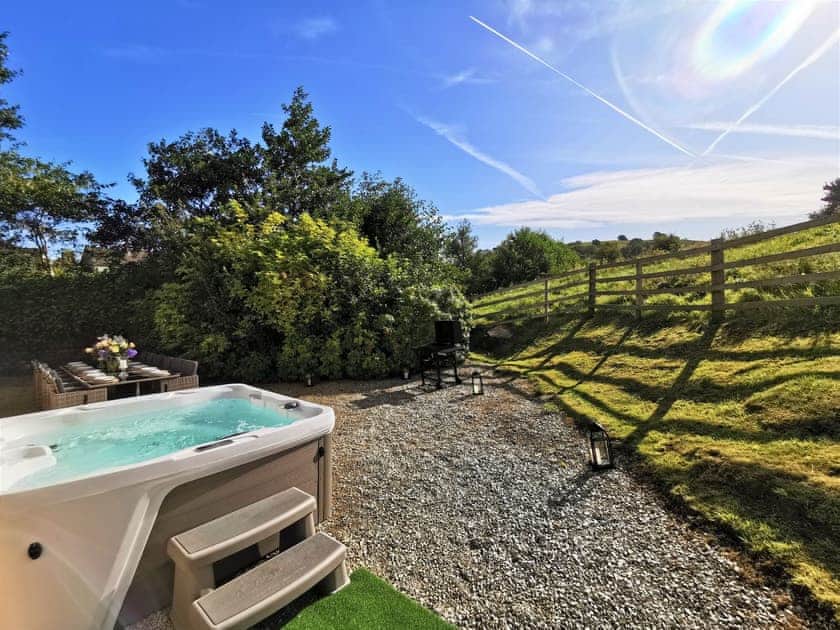 Patio area with a relaxing hot tub | Tissington Ford Barn - Bradbourne, Bradbourne, near Ashbourne