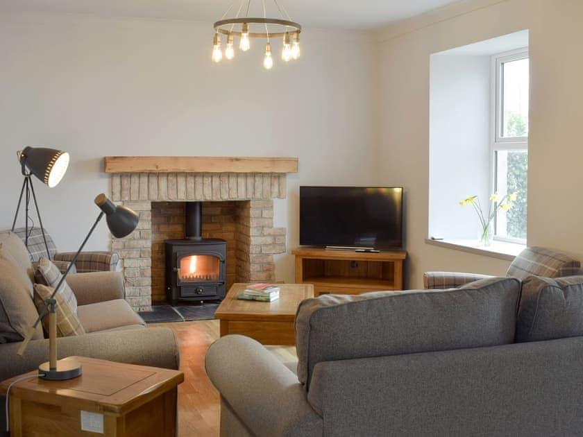 Charming living area with cosy wood burner | The School House, New Luce, near Newton Stewart