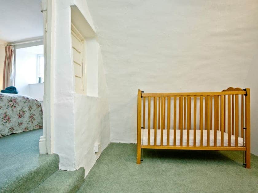 Relaxing double bedroom with separate dressing/cot area | 2 Castle Cottage - Tuckenhay Mill, Bow Creek, between Dartmouth and Totnes