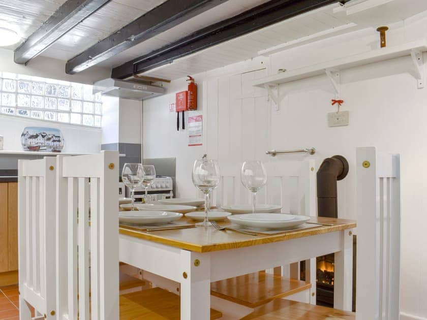 Well equipped kitchen/ dining room with electric wood burner | Cobblestones, Whitby