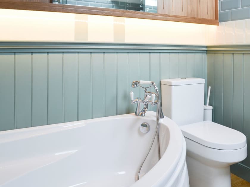 Half-panelled bathroom | Forge Villa, Ebberston, near Pickering