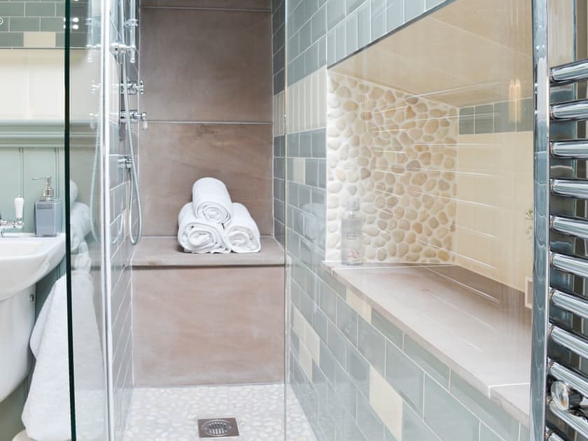 Bathroom with shower cubicle and heated towel rail | Forge Villa, Ebberston, near Pickering