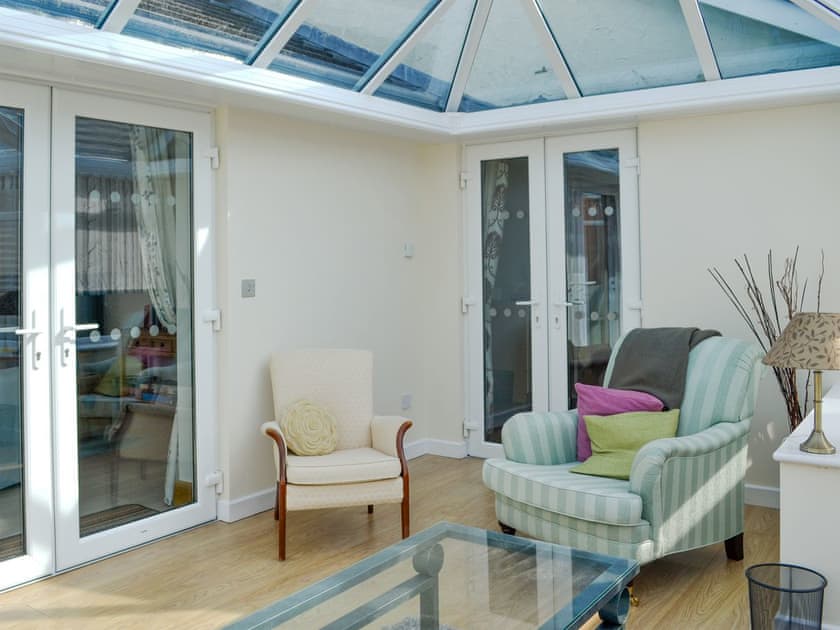 Relaxing conservatory | Dylmor, Benllech 