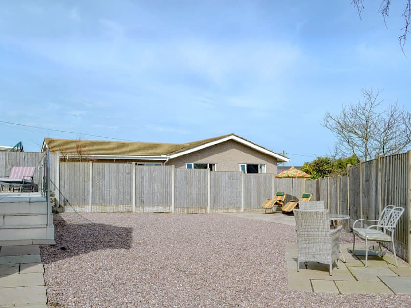 Spacious grounds with sitting out area | Dylmor, Benllech 