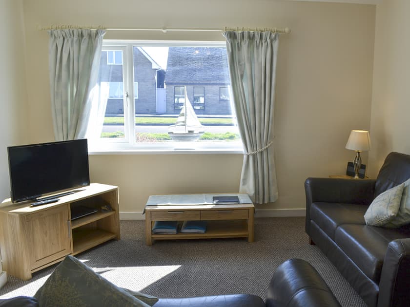 Comfortable living/dining room | Summerhouse Cottage, Beadnell, near Seahouses