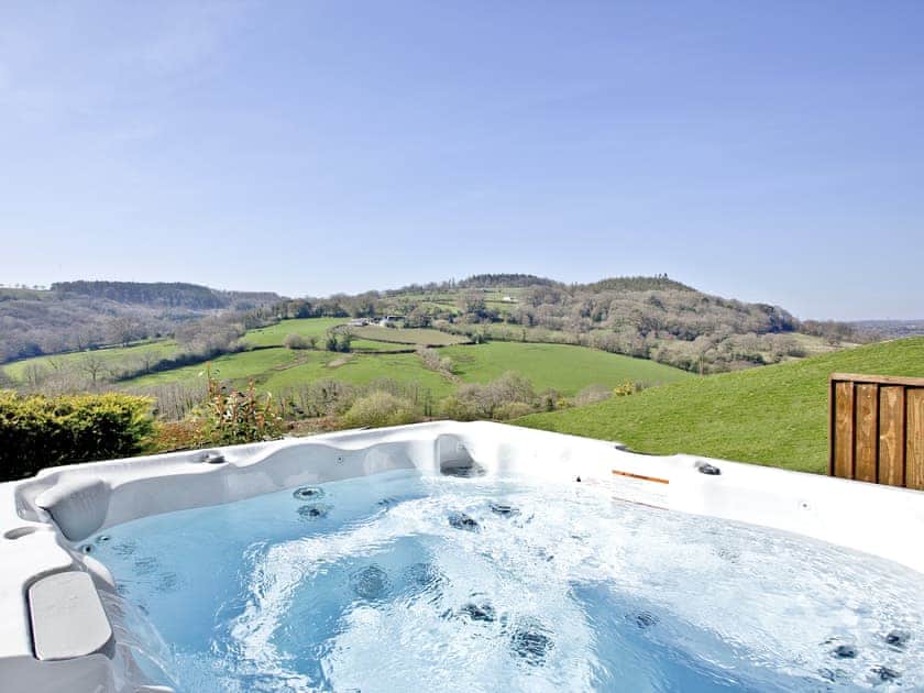 Private hot tub with stunning views | Woodland View Lodge, Axminster