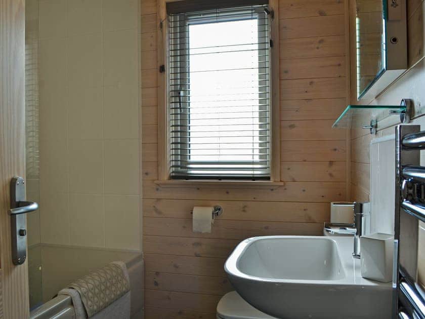 Bathroom with full sized bath with a shower | Bransty, Burnside Park
