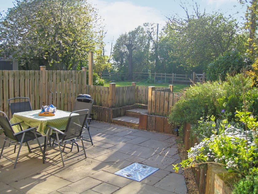 Inviting patio  | Wallages Cottage - White House Farm Holiday Cottages, Knapton, near North Walsham