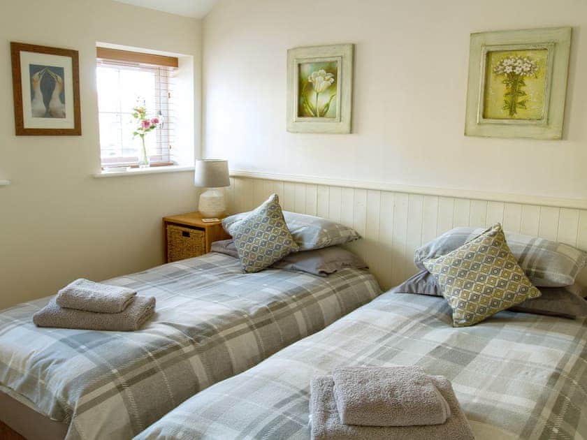 Relaxing bedroom with en-suite shower room | Gannet Lodge - Seabird Lodges, Bempton