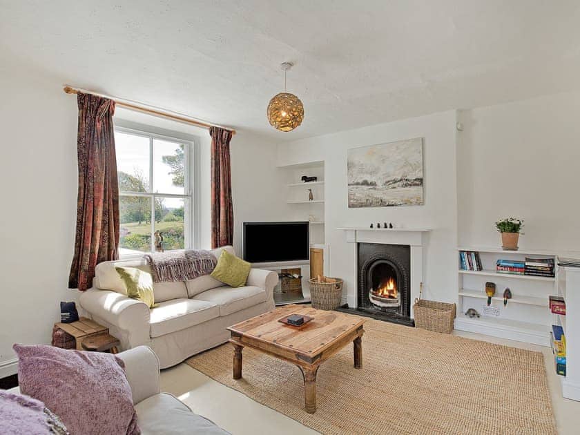 Stylish living room with open fire | Duck Cottage, Gargrave
