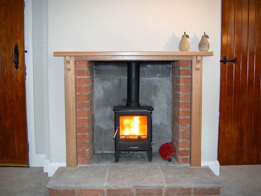Cosy living/dining room with wood burner | Summergate Cottage, Annan