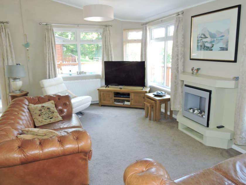 Homely living area | Windermere Lodge, 