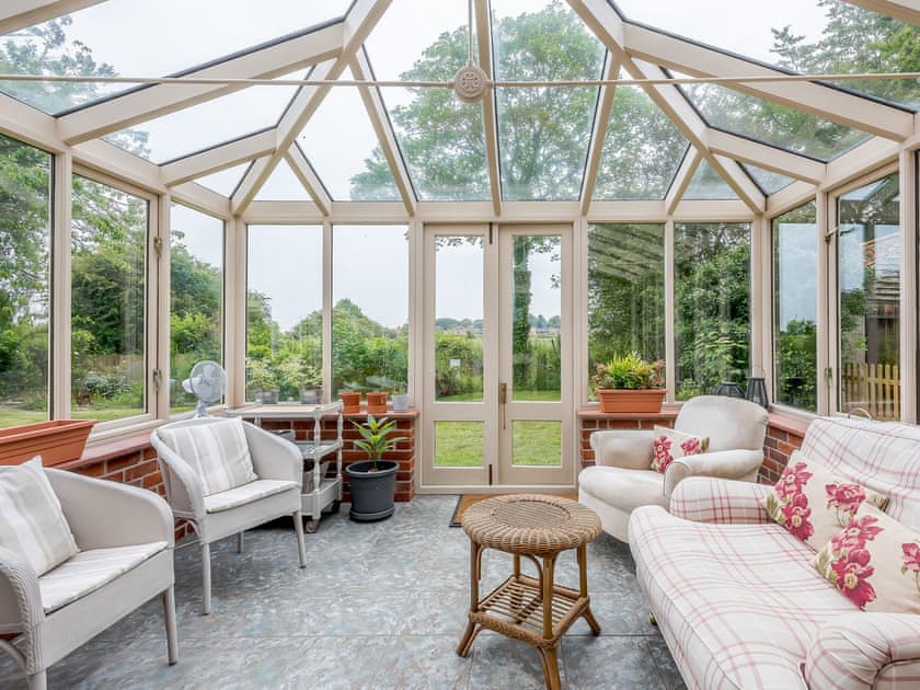 Light and airy conservatory | Leatherpool Place, Wiveton, near Holt