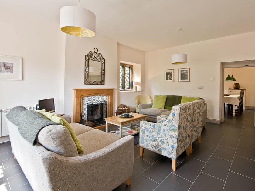 Inviting living room with open aspect to the kitchen/diner | The Old Hall - Swarthmoor Hall, Swarthmoor, near Ulverston