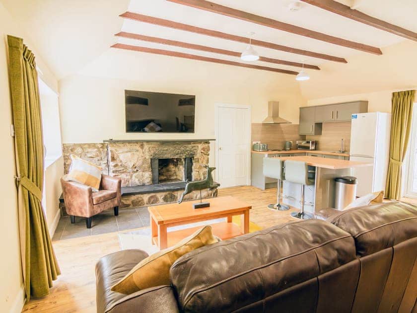Large open plan kitchen and sitting area with fire   | Keepers Cottage - Dalnagar Castle And Cottages, Glenshee, near Blairgowrie