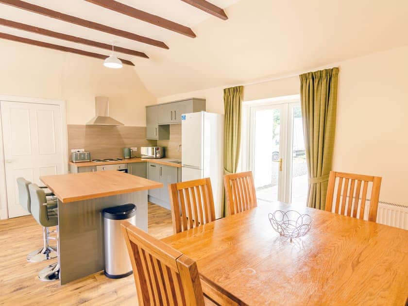 Large open plan kitchen and sitting area with fire: large open plan kitchen and sitting area with fire   | Keepers Cottage - Dalnagar Castle And Cottages, Glenshee, near Blairgowrie