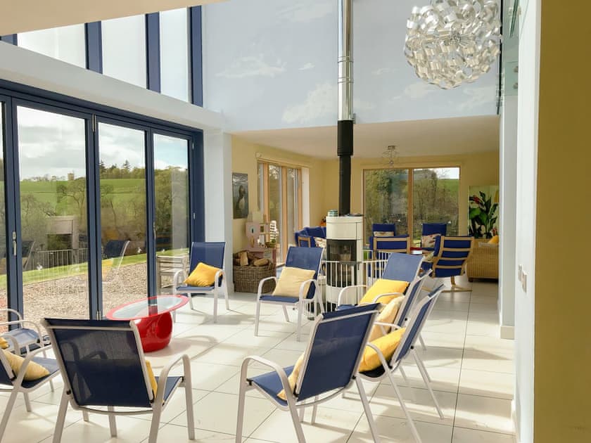 Light and airy living area with ample seating | Wester Auchleuchrie, Memus, near Kirriemuir