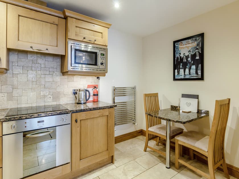 convenient dining area within the kitchen | Orchard Sands, Beadnell